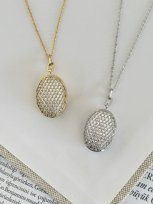 Açılır Kapaklı Zirkon Taşlı Oval Formlu Kolye