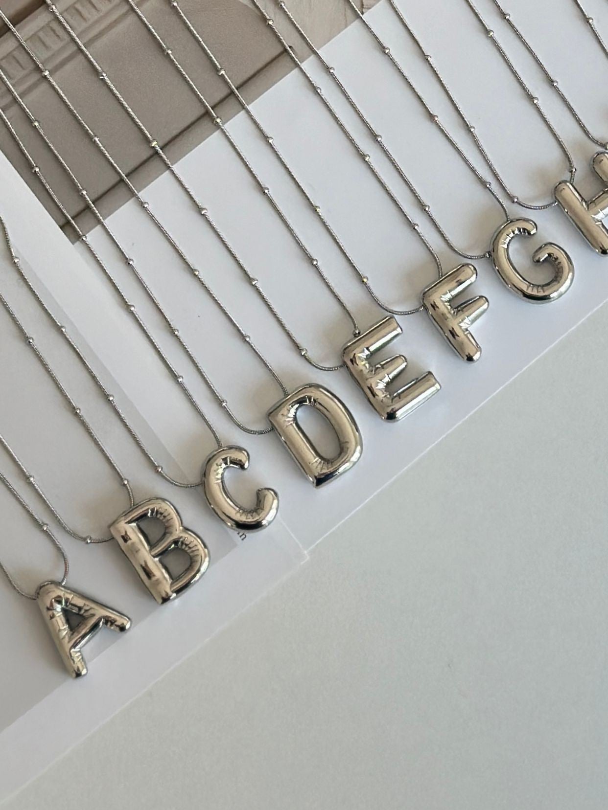 Gümüş Renk Balon Çelik Harf Kolye