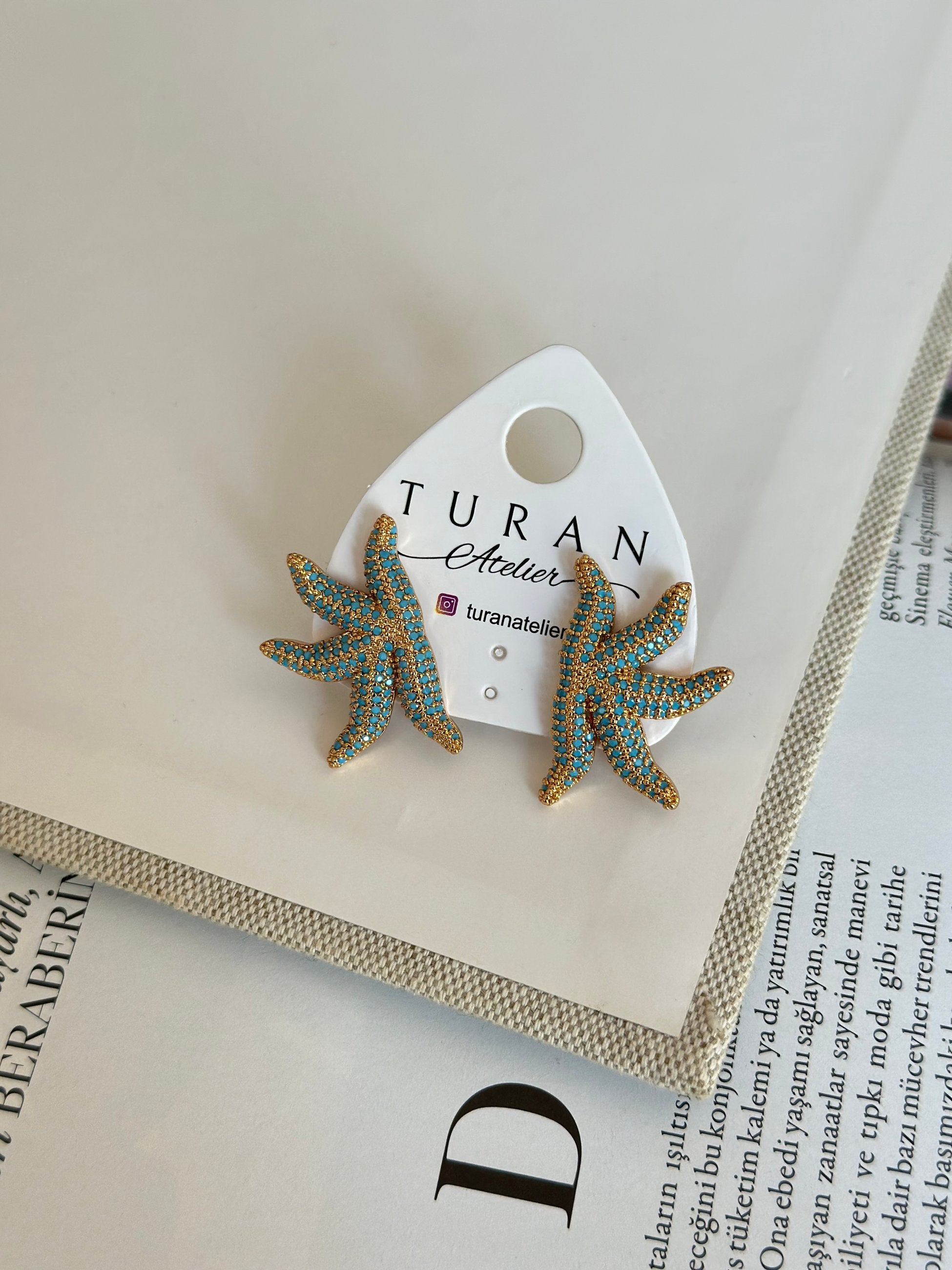 Mavi Taşlı Gold Deniz Yıldızı Küpe